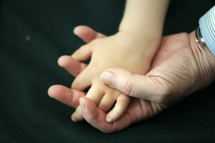 hand in hand father and son