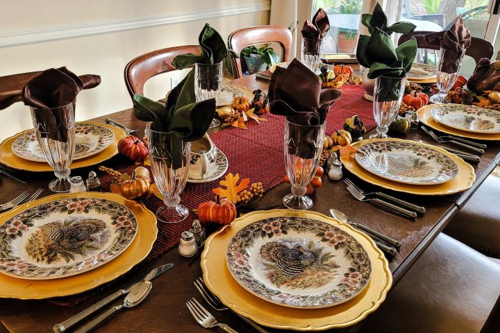 Beautiful tablescape in living room of home for family gathering during the holidays.